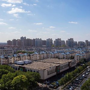 Отель Courtyard By Marriott Shanghai Fengxian Exterior photo