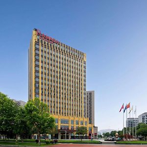 Отель Ramada By Wyndham Changsha East Huanghua Exterior photo